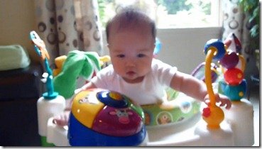 First Time in Exersaucer-Desktop